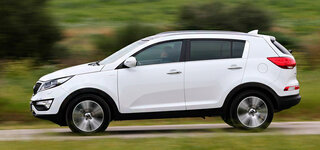 kia-sportage-2014-lateral-deluxe-white.310391.jpg
